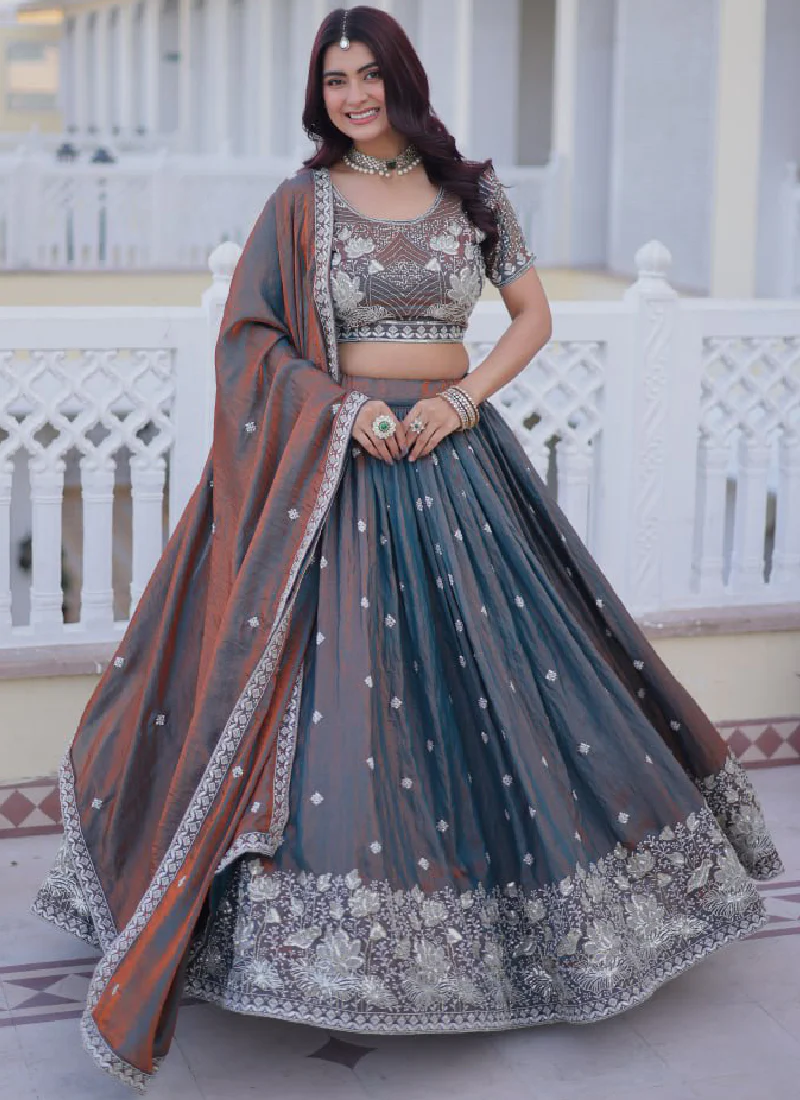 Astonishing Sequence Zari Work Two Tone Silk Party Wear Lehenga Choli