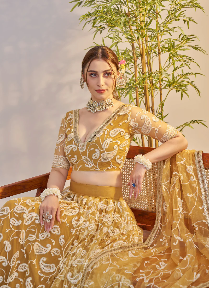 Bewitching Yellow Net Thread Embroidered Haldi Special Lehenga Choli - Image 2